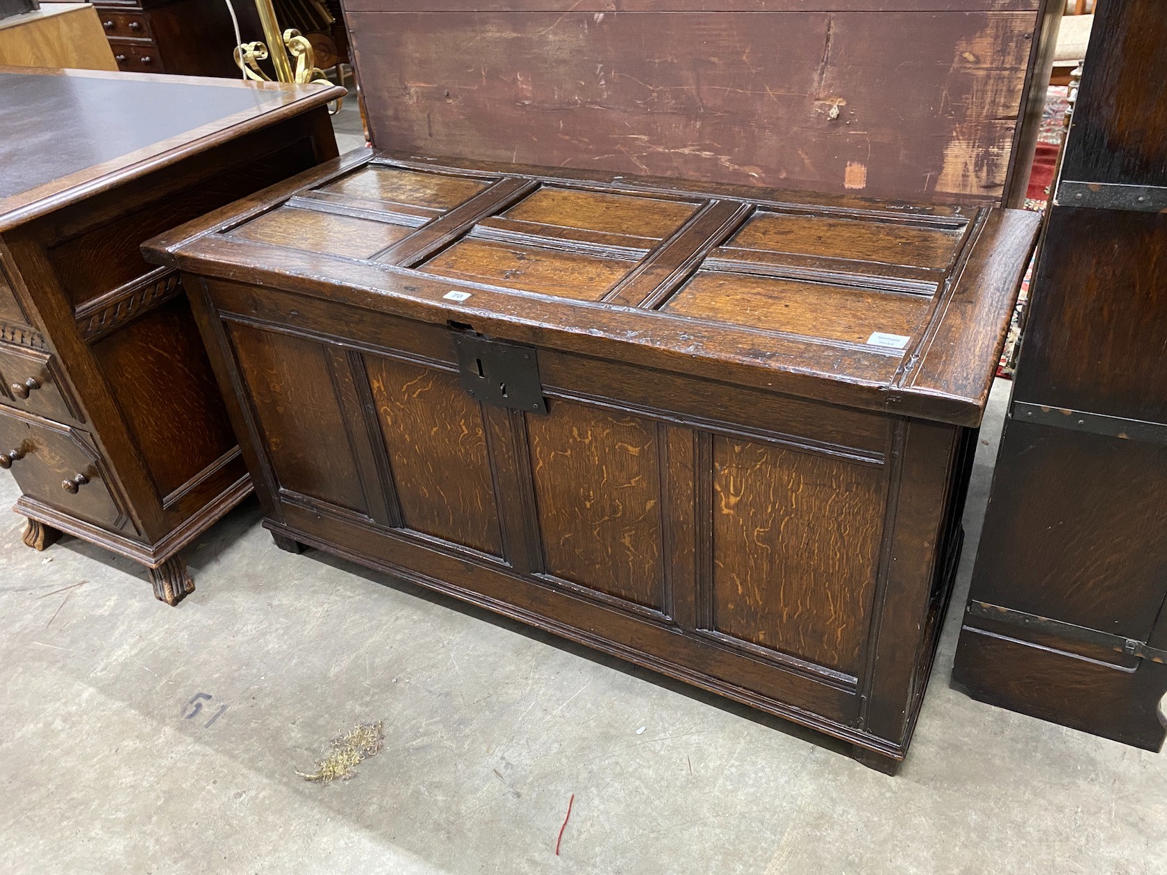 A late 17th century and later country panelled oak coffer, length 126cm, depth 55cm, height 64cm